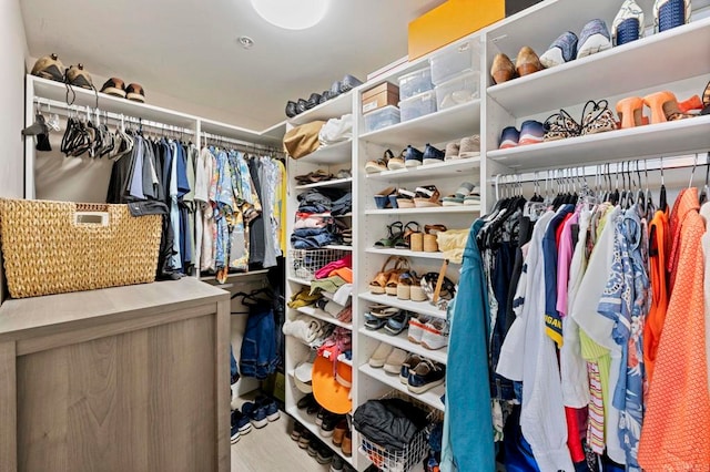 1325 Pacific Hwy Unit 1004, San Diego, CA 92101 - walk in closet featuring wood finished floors