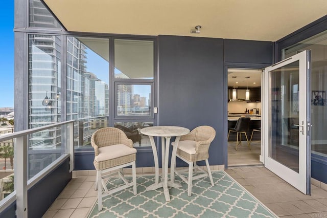 1325 Pacific Hwy Unit 1004, San Diego, CA 92101 - sunroom featuring healthy amount of natural light, tile patterned flooring, and a view of city