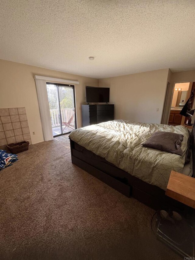 8606 Valley View Trl, Pine Valley, CA 91962 - carpeted bedroom with access to exterior and a textured ceiling