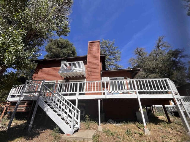 8606 Valley View Trl, Pine Valley, CA 91962 - back of property with a chimney, a wooden deck, and stairway