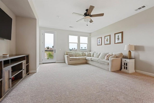 3520 Conner Way, Oceanside, CA 92056 - living area with light colored carpet and a ceiling fan