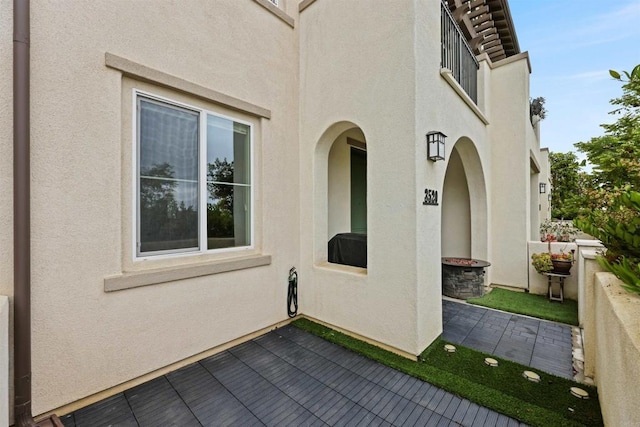 3520 Conner Way, Oceanside, CA 92056 - view of side of home with stucco siding and a patio area