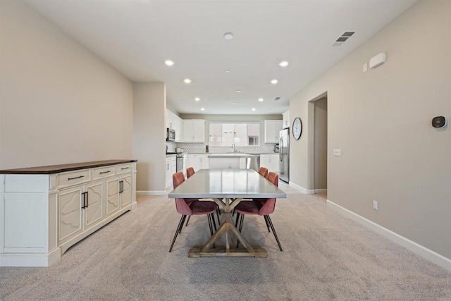 3520 Conner Way, Oceanside, CA 92056 - dining area with recessed lighting and light carpet