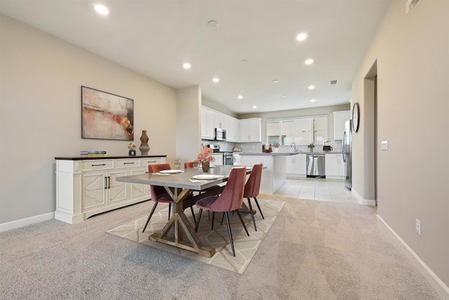3520 Conner Way, Oceanside, CA 92056 - dining area with recessed lighting and light carpet