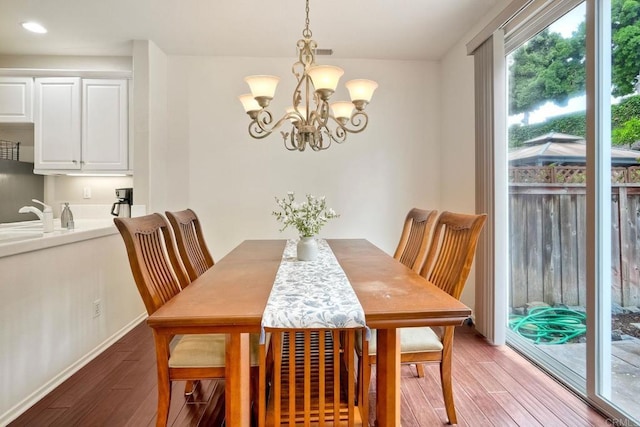 4049 Peninsula Dr, Carlsbad, CA 92010 - dining room featuring light wood-style floors, a chandelier, and recessed lighting