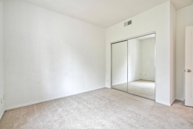4049 Peninsula Dr, Carlsbad, CA 92010 - unfurnished bedroom with carpet floors and a closet