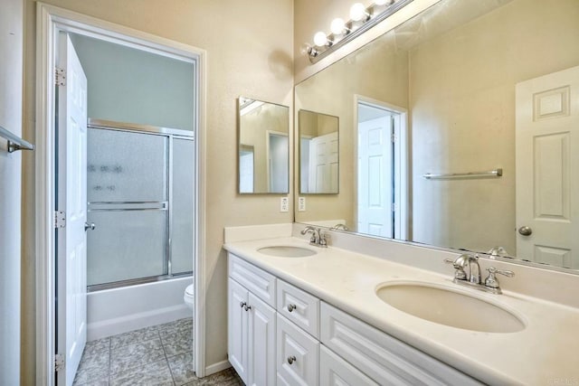 4049 Peninsula Dr, Carlsbad, CA 92010 - bathroom featuring double vanity, shower / bath combination with glass door, and tile patterned floors