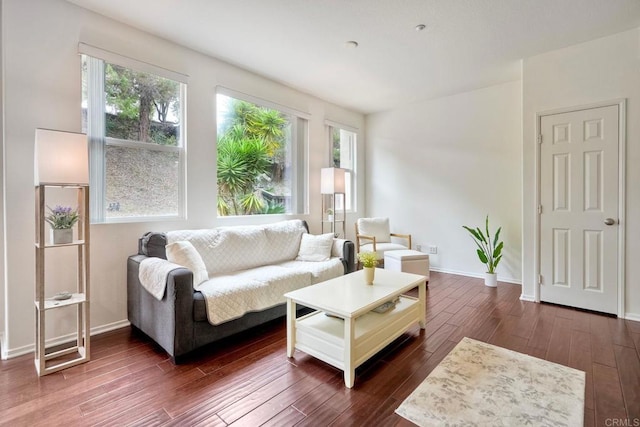 4049 Peninsula Dr, Carlsbad, CA 92010 - living room with healthy amount of natural light and dark wood-type flooring