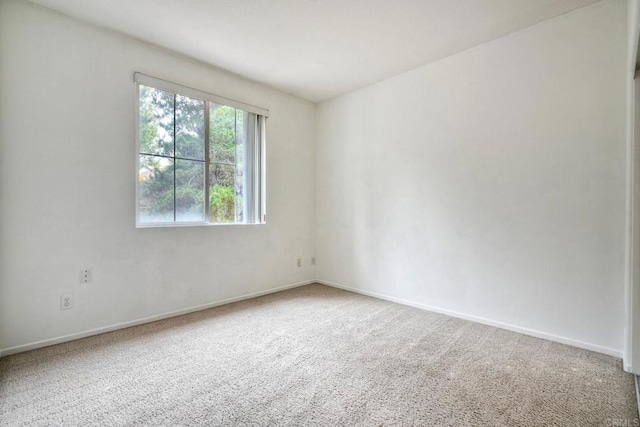 4049 Peninsula Dr, Carlsbad, CA 92010 - carpeted spare room featuring baseboards