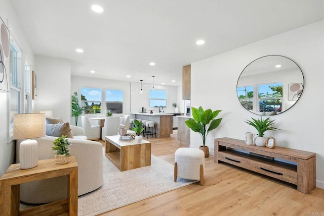 640 Pyramid St, San Diego, CA 92114 - living room with recessed lighting and light wood finished floors