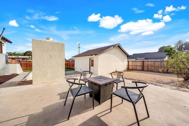640 Pyramid St, San Diego, CA 92114 - fenced backyard with an outdoor fire pit and a patio area