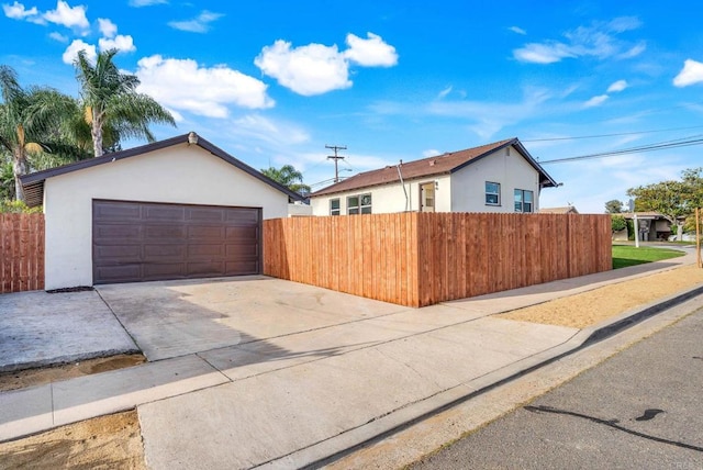 640 Pyramid St, San Diego, CA 92114 - view of side of property with stucco siding and driveway