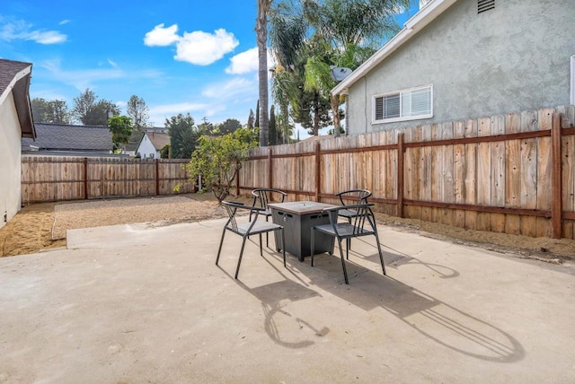 640 Pyramid St, San Diego, CA 92114 - fenced backyard with a fire pit and a patio area