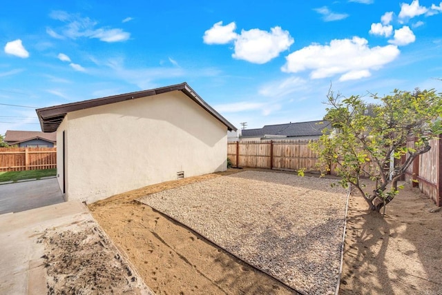 640 Pyramid St, San Diego, CA 92114 - view of home's exterior featuring a fenced backyard, stucco siding, and a patio area