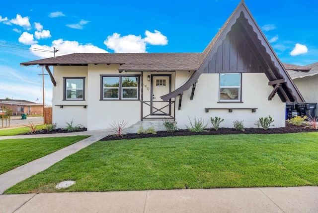 640 Pyramid St, San Diego, CA 92114 - view of front of house featuring a front lawn, roof with shingles, and stucco siding