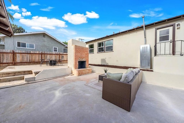 640 Pyramid St, San Diego, CA 92114 - view of patio / terrace featuring an outdoor living space with a fireplace