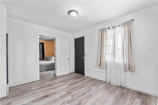 671 N Cherry St, Banning, CA 92220 - spare room with wood finished floors and baseboards