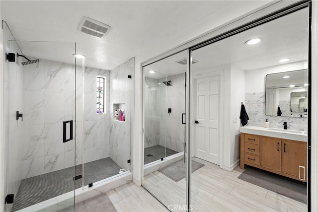 917 Hyde Ct, Costa Mesa, CA 92626 - full bath featuring vanity, a marble finish shower, and recessed lighting
