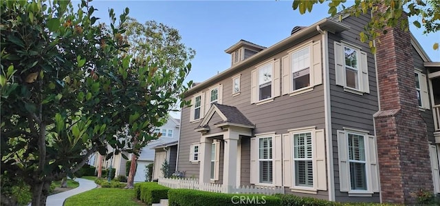 2 Lynde St, Ladera Ranch, CA 92694 - view of side of property featuring a chimney