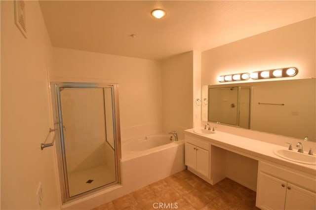 2 Lynde St, Ladera Ranch, CA 92694 - bathroom featuring a bath, double vanity, a shower stall, and tile patterned flooring