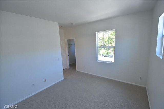 2 Lynde St, Ladera Ranch, CA 92694 - carpeted empty room featuring baseboards