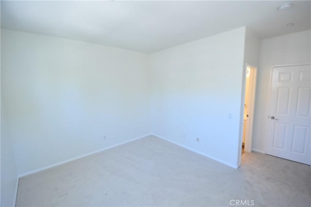 2 Lynde St, Ladera Ranch, CA 92694 - spare room featuring light colored carpet and a smoke detector