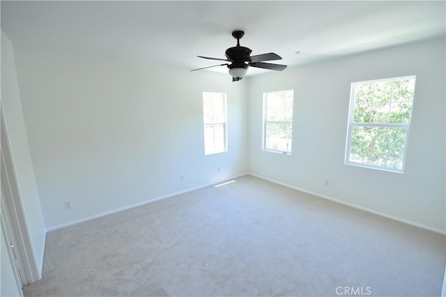 2 Lynde St, Ladera Ranch, CA 92694 - spare room with light colored carpet, healthy amount of natural light, and a ceiling fan