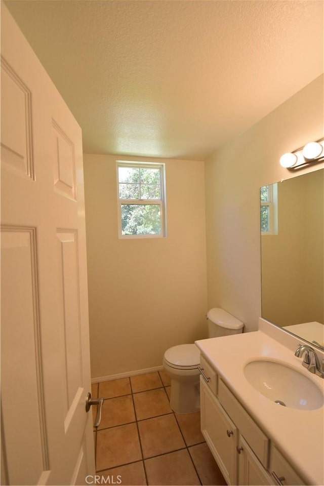 2 Lynde St, Ladera Ranch, CA 92694 - bathroom with a textured ceiling, vanity, and tile patterned flooring