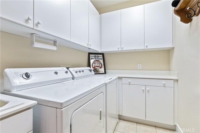 2747 Traditions Loop, Paso Robles, CA 93446 - laundry area featuring cabinet space, washing machine and dryer, and light tile patterned floors