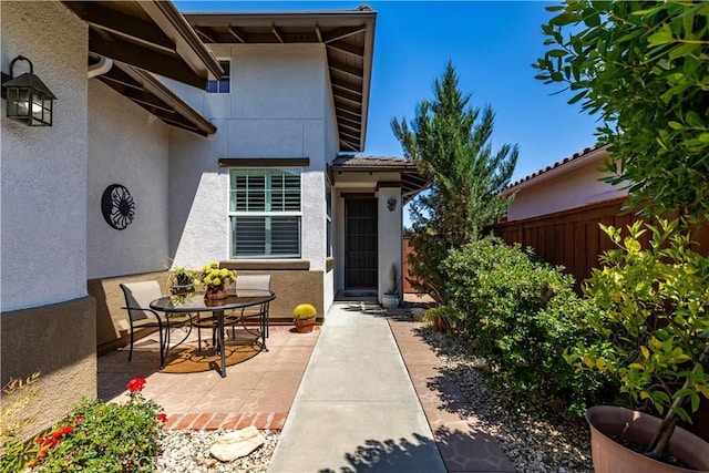 2747 Traditions Loop, Paso Robles, CA 93446 - entrance to property featuring stucco siding and a patio area