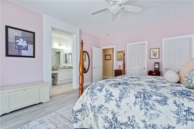 2747 Traditions Loop, Paso Robles, CA 93446 - bedroom with light wood-style floors, ensuite bath, and ceiling fan