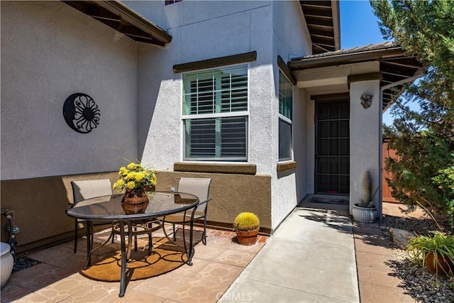 2747 Traditions Loop, Paso Robles, CA 93446 - property entrance featuring a patio area and stucco siding