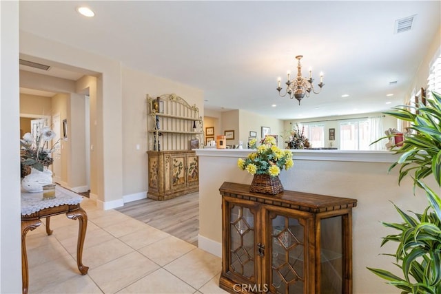 2747 Traditions Loop, Paso Robles, CA 93446 - hallway with a chandelier, recessed lighting, and light tile patterned flooring