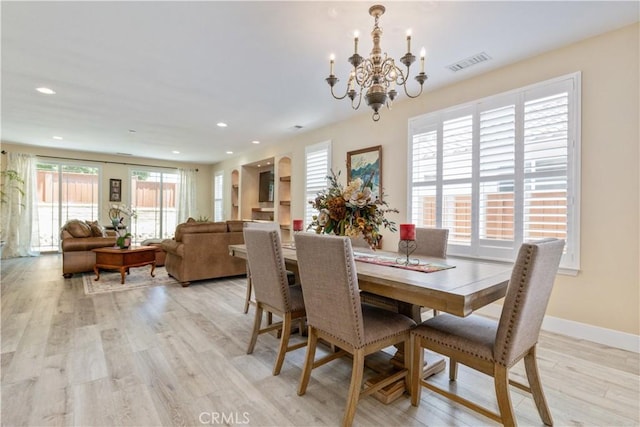 2747 Traditions Loop, Paso Robles, CA 93446 - dining space featuring a chandelier, plenty of natural light, light wood-style flooring, and recessed lighting