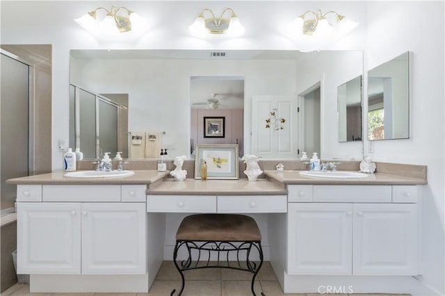 2747 Traditions Loop, Paso Robles, CA 93446 - bathroom featuring double vanity, a shower stall, tile patterned flooring, and ceiling fan