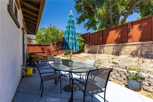 2747 Traditions Loop, Paso Robles, CA 93446 - fenced backyard with outdoor dining area and a patio area