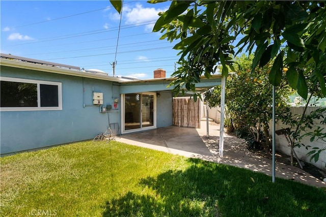 10402 Oronsay Cir, Huntington Beach, CA 92646 - back of property with stucco siding and a patio area
