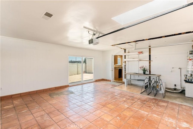 10402 Oronsay Cir, Huntington Beach, CA 92646 - garage with a garage door opener and baseboards