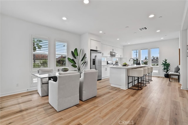 536 Caleigh Ln, Costa Mesa, CA 92627 - dining space featuring light wood finished floors, recessed lighting, and baseboards
