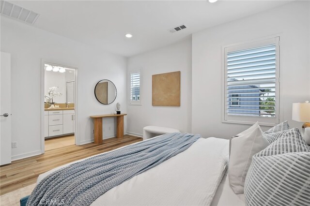 536 Caleigh Ln, Costa Mesa, CA 92627 - bedroom featuring light wood finished floors, recessed lighting, baseboards, and connected bathroom