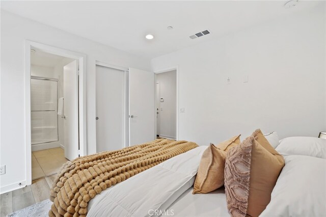 536 Caleigh Ln, Costa Mesa, CA 92627 - bedroom with recessed lighting, ensuite bathroom, wood finished floors, and a closet