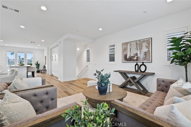 536 Caleigh Ln, Costa Mesa, CA 92627 - living room with light wood-style flooring, recessed lighting, and baseboards