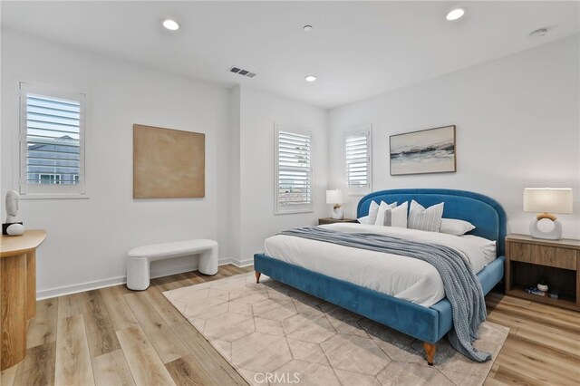 536 Caleigh Ln, Costa Mesa, CA 92627 - bedroom featuring light wood-type flooring, recessed lighting, and baseboards