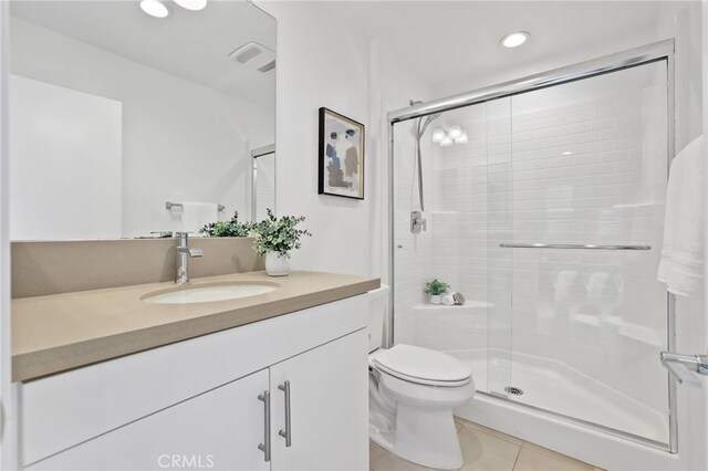 536 Caleigh Ln, Costa Mesa, CA 92627 - full bathroom featuring vanity, a stall shower, toilet, recessed lighting, and tile patterned flooring