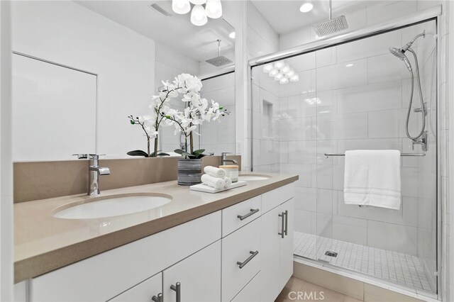 536 Caleigh Ln, Costa Mesa, CA 92627 - bathroom with double vanity and a stall shower