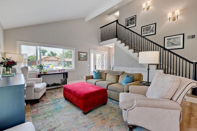 5431 Stirrup Way, Oceanside, CA 92057 - living room featuring wood finished floors, beamed ceiling, stairway, and high vaulted ceiling