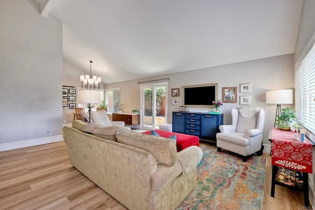 5431 Stirrup Way, Oceanside, CA 92057 - living room with light wood finished floors, vaulted ceiling, and a chandelier