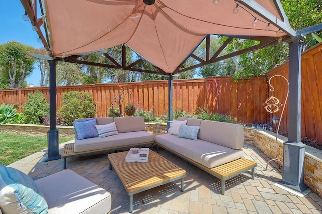 5431 Stirrup Way, Oceanside, CA 92057 - fenced backyard featuring an outdoor living space and a patio