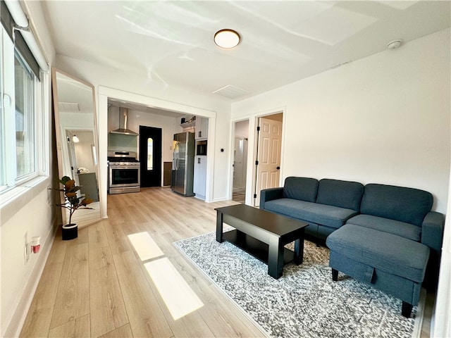 210 Amabel St, Los Angeles, CA 90065 - living room featuring light wood-style floors and plenty of natural light