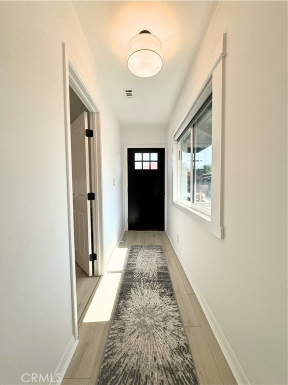210 Amabel St, Los Angeles, CA 90065 - entryway featuring wood finished floors and baseboards